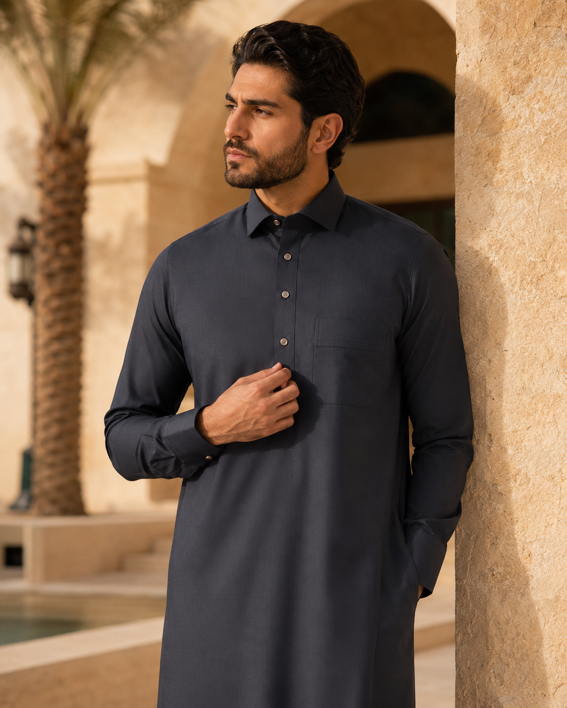 Premium Midnight Black Thobe by Al-Emara, featuring traditional Arab men's Islamic clothing with a sleek, elegant design.
