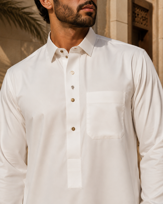 Royal Ivory white thick fabric from Al-Emara, showing a close-up of soft, high-quality textile with detailed weave.